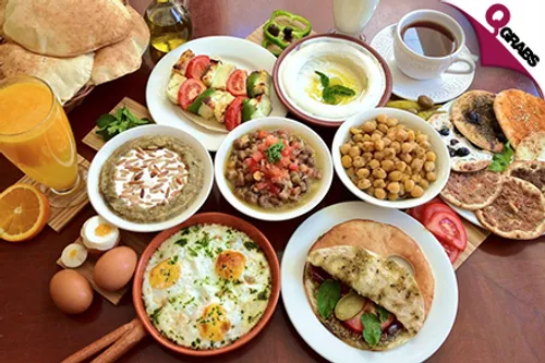 For QR15 Enjoy your choice of Delicious Sandwich with Small Fries & Juice OR For QR35 Enjoy your choice of Traditional Arabic Food! (Up to QR70 Value)